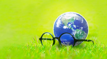 Afbeelding (kleur) wereldbol met bril
